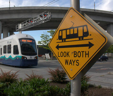 read the letter to the editor here Seattle light rail car goes past intersection and yellow traffic sign