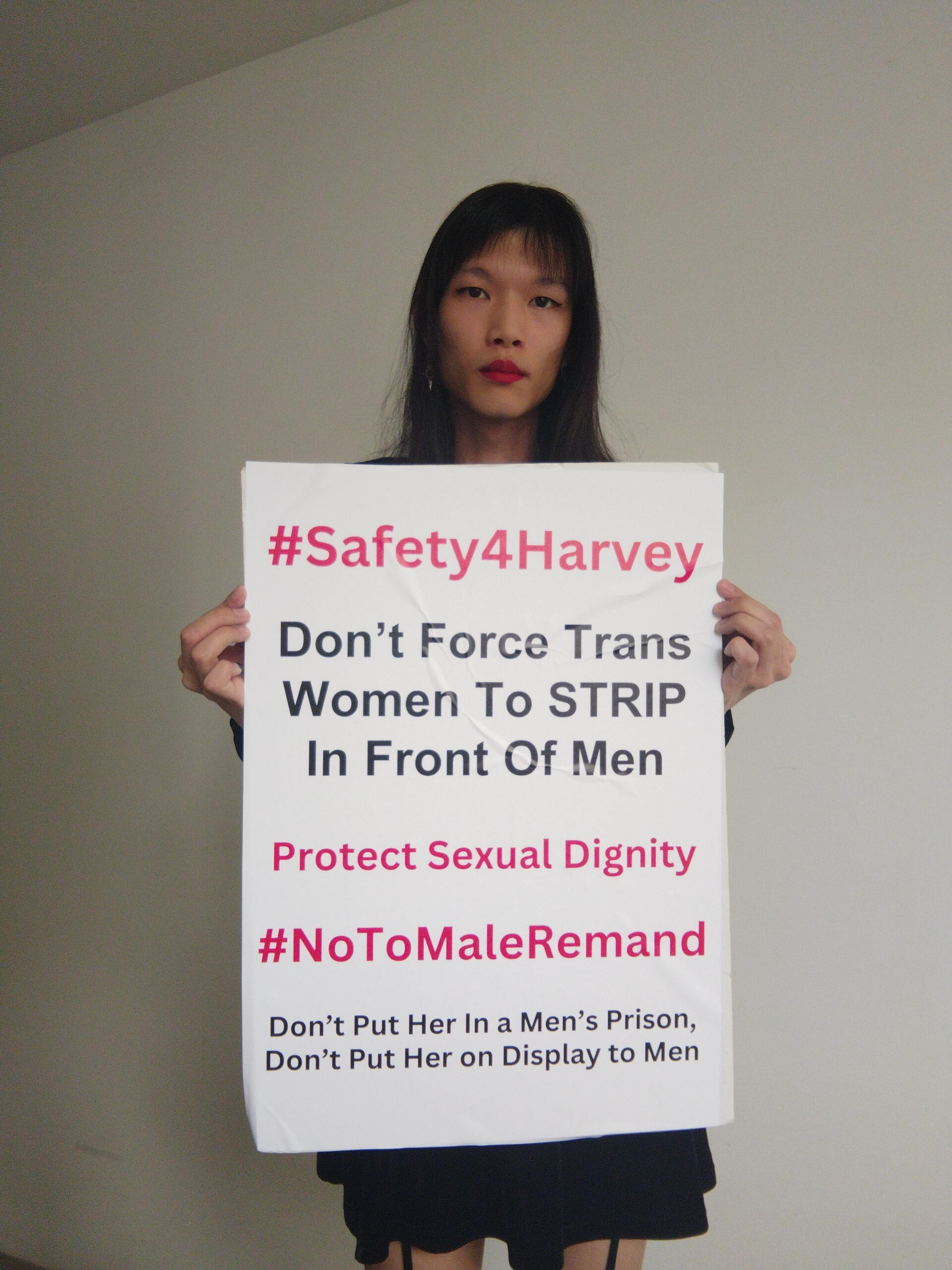 Read the investigative story here Singapore transgender activist Lune Loh holds protest sign #Safety4Harvey
