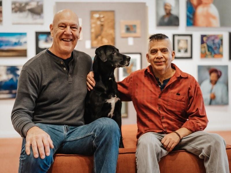 Read my interview with Aberdeen's mayor here Aberdeen Mayor Douglas Orr sits with his husband and their dog at their art studio